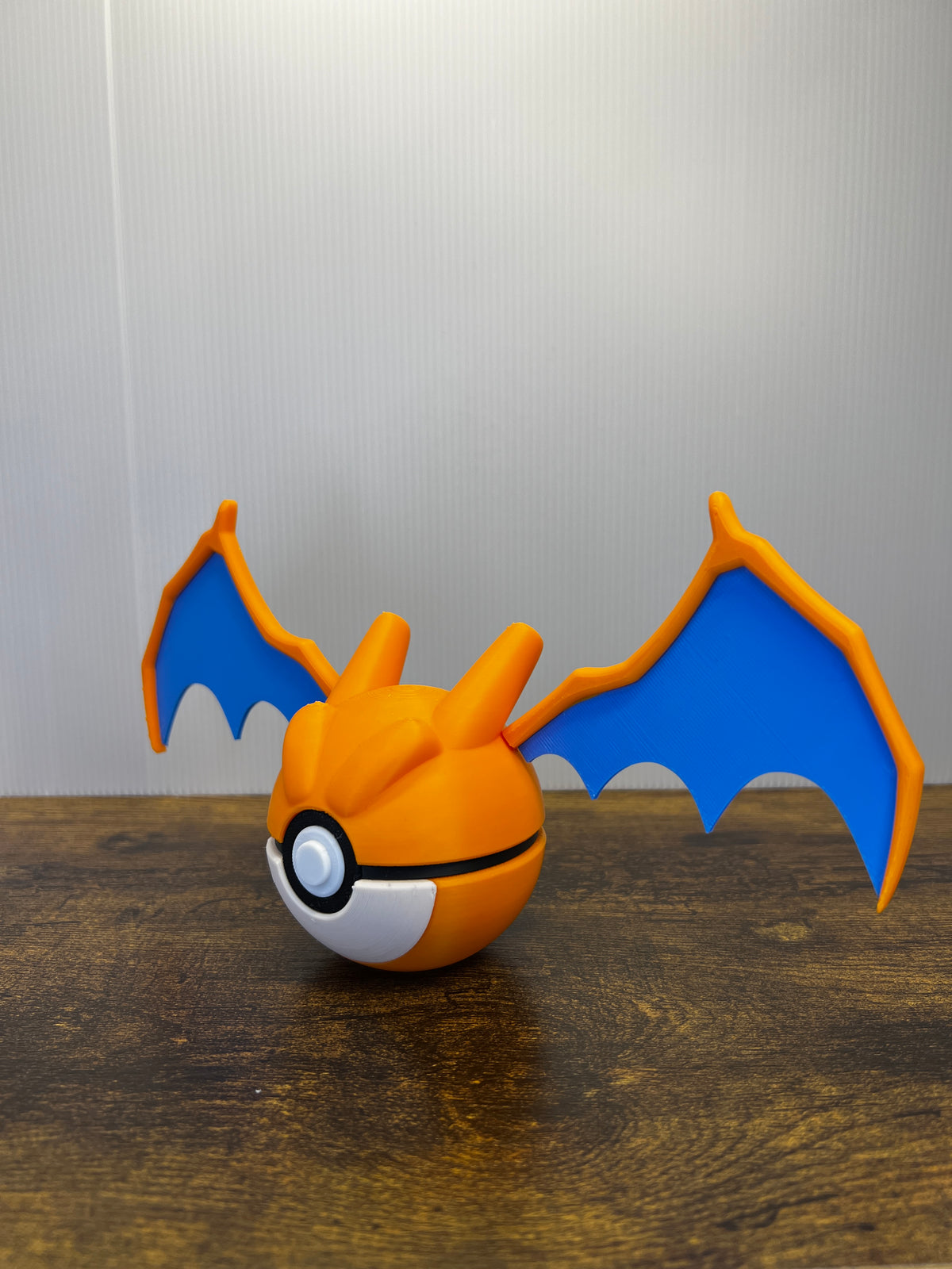 Charizard Poké Ball – Pokémon-Inspired Display Stand
