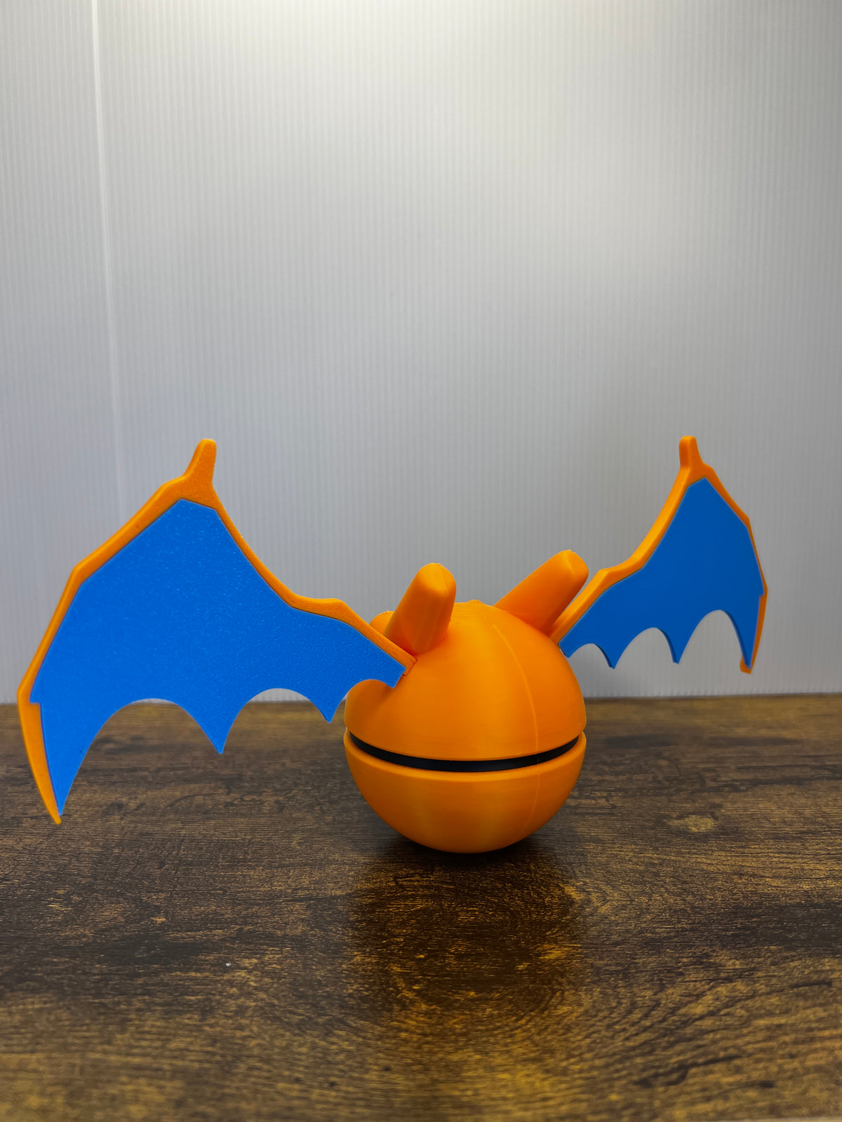 Charizard Poké Ball – Pokémon-Inspired Display Stand